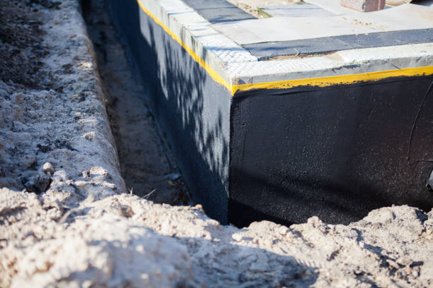 Professional Waterproofing technician working in Hanover, IN